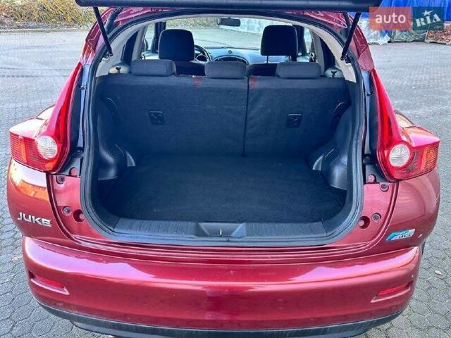 Красный Ниссан Жук, объемом двигателя 1.5 л и пробегом 155 тыс. км за 9800 $, фото 1 на Automoto.ua