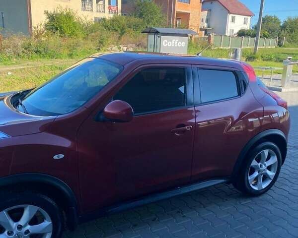 Червоний Ніссан Жук, об'ємом двигуна 1.6 л та пробігом 105 тис. км за 11450 $, фото 1 на Automoto.ua