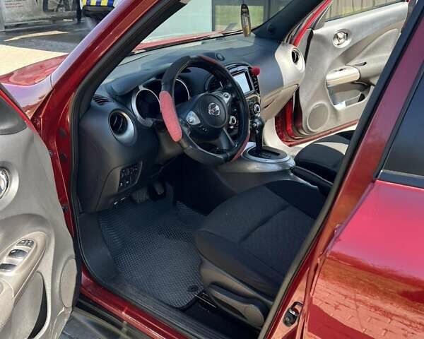 Красный Ниссан Жук, объемом двигателя 1.6 л и пробегом 125 тыс. км за 9700 $, фото 14 на Automoto.ua