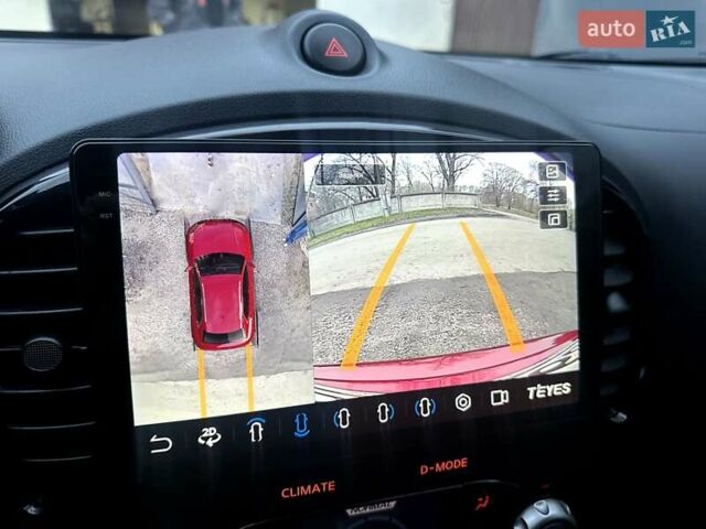 Червоний Ніссан Жук, об'ємом двигуна 1.6 л та пробігом 147 тис. км за 9999 $, фото 25 на Automoto.ua