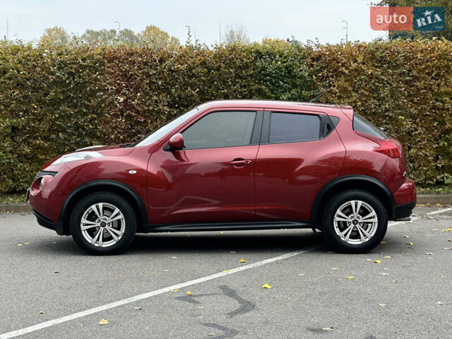 Красный Ниссан Жук, объемом двигателя 1.6 л и пробегом 130 тыс. км за 10500 $, фото 10 на Automoto.ua