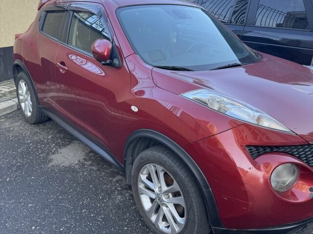 Червоний Ніссан Жук, об'ємом двигуна 1.6 л та пробігом 120 тис. км за 10500 $, фото 4 на Automoto.ua