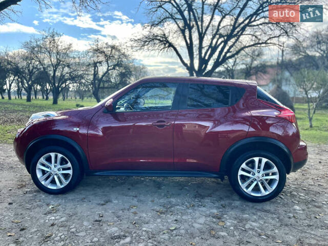 Красный Ниссан Жук, объемом двигателя 1.5 л и пробегом 197 тыс. км за 8950 $, фото 6 на Automoto.ua