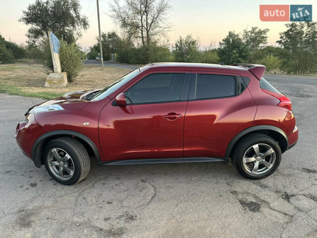 Красный Ниссан Жук, объемом двигателя 1.6 л и пробегом 168 тыс. км за 10900 $, фото 4 на Automoto.ua