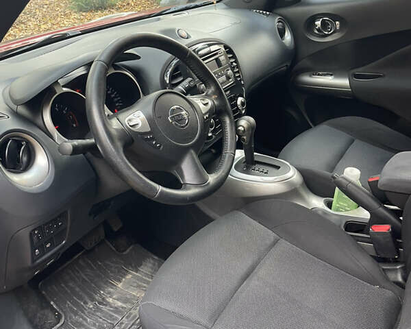 Красный Ниссан Жук, объемом двигателя 1.6 л и пробегом 98 тыс. км за 11500 $, фото 7 на Automoto.ua