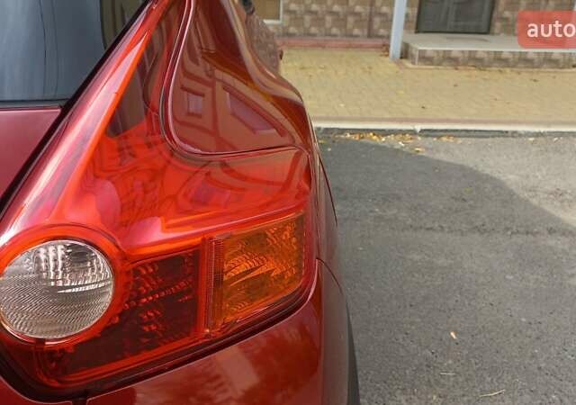 Червоний Ніссан Жук, об'ємом двигуна 1.6 л та пробігом 199 тис. км за 9700 $, фото 1 на Automoto.ua