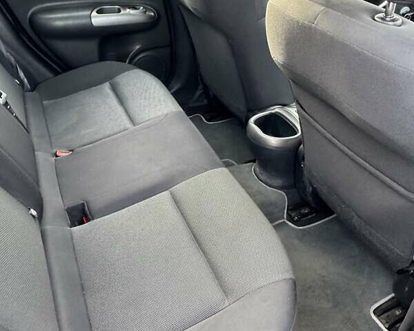 Красный Ниссан Жук, объемом двигателя 1.6 л и пробегом 117 тыс. км за 9900 $, фото 10 на Automoto.ua