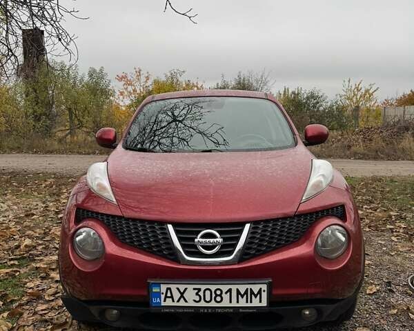 Червоний Ніссан Жук, об'ємом двигуна 1.6 л та пробігом 211 тис. км за 10500 $, фото 1 на Automoto.ua