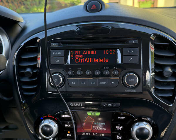 Красный Ниссан Жук, объемом двигателя 1.6 л и пробегом 70 тыс. км за 11500 $, фото 5 на Automoto.ua