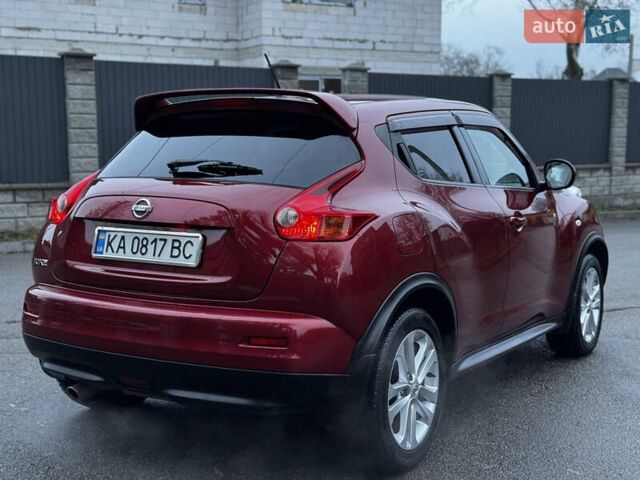 Червоний Ніссан Жук, об'ємом двигуна 1.6 л та пробігом 97 тис. км за 10750 $, фото 25 на Automoto.ua