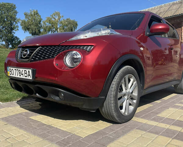 Красный Ниссан Жук, объемом двигателя 1.6 л и пробегом 147 тыс. км за 10500 $, фото 5 на Automoto.ua