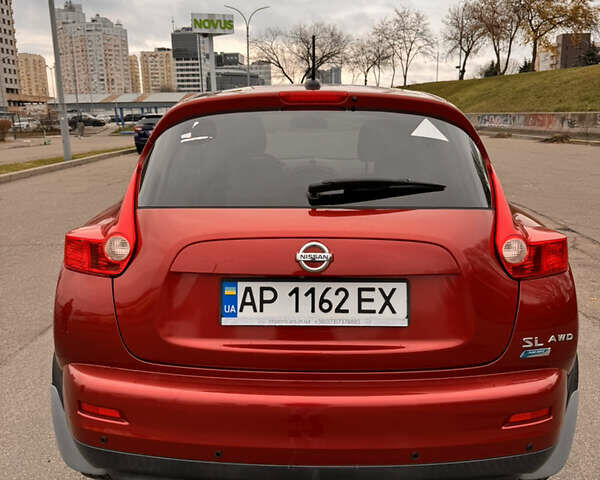 Червоний Ніссан Жук, об'ємом двигуна 1.6 л та пробігом 86 тис. км за 9999 $, фото 7 на Automoto.ua