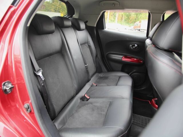 Красный Ниссан Жук, объемом двигателя 1.6 л и пробегом 154 тыс. км за 9700 $, фото 8 на Automoto.ua