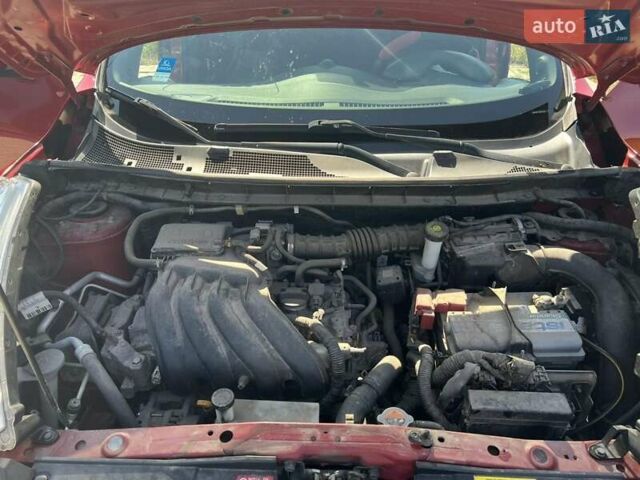 Красный Ниссан Жук, объемом двигателя 1.6 л и пробегом 125 тыс. км за 9700 $, фото 5 на Automoto.ua