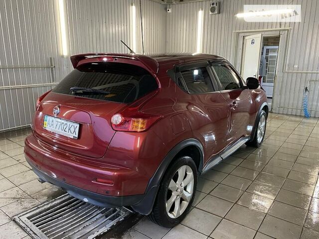 Червоний Ніссан Жук, об'ємом двигуна 1.6 л та пробігом 143 тис. км за 9800 $, фото 6 на Automoto.ua