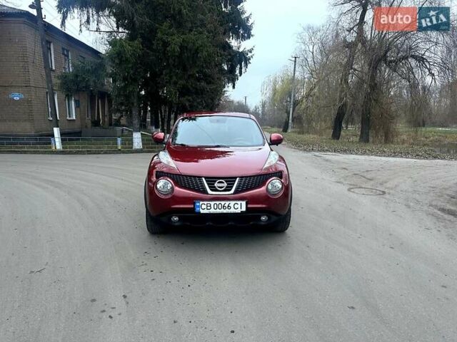 Червоний Ніссан Жук, об'ємом двигуна 1.6 л та пробігом 147 тис. км за 9999 $, фото 13 на Automoto.ua