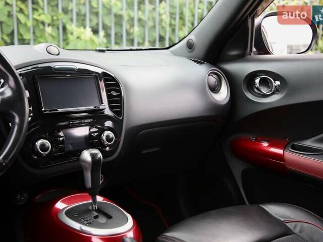 Красный Ниссан Жук, объемом двигателя 1.62 л и пробегом 154 тыс. км за 9900 $, фото 12 на Automoto.ua