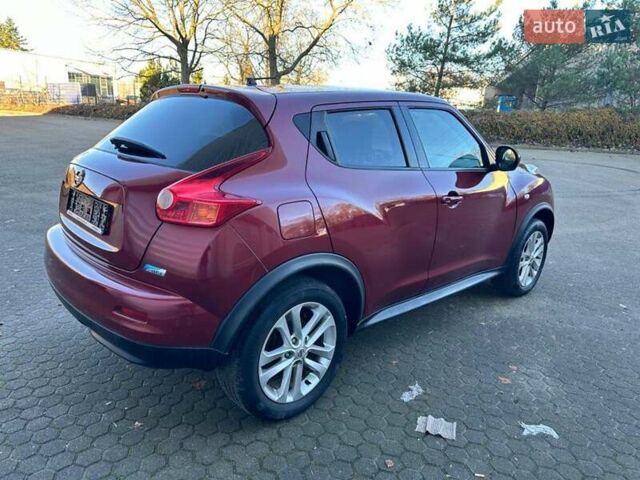 Красный Ниссан Жук, объемом двигателя 1.5 л и пробегом 155 тыс. км за 9800 $, фото 6 на Automoto.ua