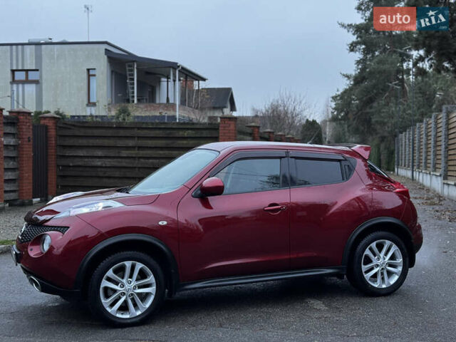 Червоний Ніссан Жук, об'ємом двигуна 1.6 л та пробігом 97 тис. км за 10750 $, фото 17 на Automoto.ua