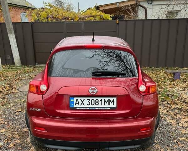 Червоний Ніссан Жук, об'ємом двигуна 1.6 л та пробігом 211 тис. км за 10500 $, фото 4 на Automoto.ua