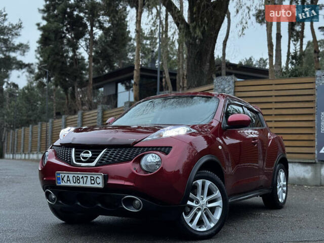 Червоний Ніссан Жук, об'ємом двигуна 1.6 л та пробігом 97 тис. км за 10750 $, фото 2 на Automoto.ua