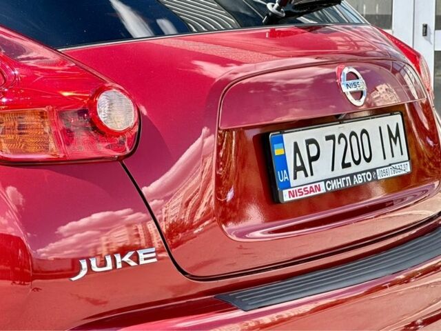 Красный Ниссан Жук, объемом двигателя 1.6 л и пробегом 123 тыс. км за 9000 $, фото 5 на Automoto.ua