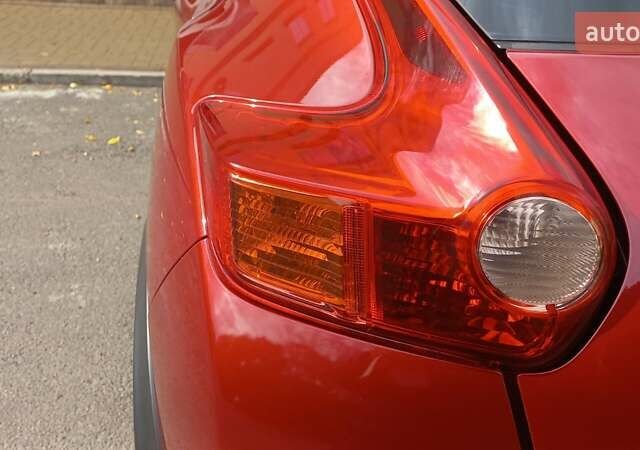 Червоний Ніссан Жук, об'ємом двигуна 1.6 л та пробігом 199 тис. км за 9700 $, фото 3 на Automoto.ua