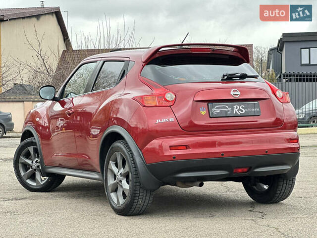 Красный Ниссан Жук, объемом двигателя 1.6 л и пробегом 130 тыс. км за 9999 $, фото 1 на Automoto.ua