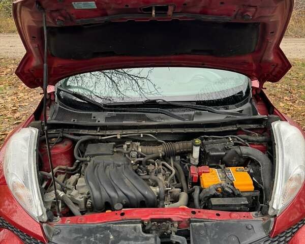 Червоний Ніссан Жук, об'ємом двигуна 1.6 л та пробігом 211 тис. км за 10500 $, фото 9 на Automoto.ua