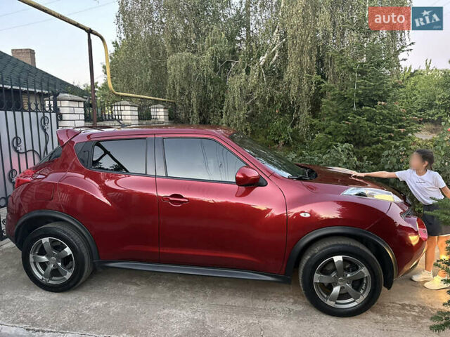 Красный Ниссан Жук, объемом двигателя 1.6 л и пробегом 168 тыс. км за 10900 $, фото 3 на Automoto.ua