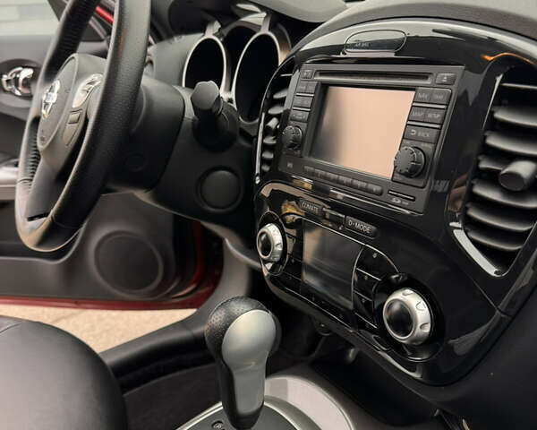 Червоний Ніссан Жук, об'ємом двигуна 1.6 л та пробігом 86 тис. км за 9999 $, фото 18 на Automoto.ua