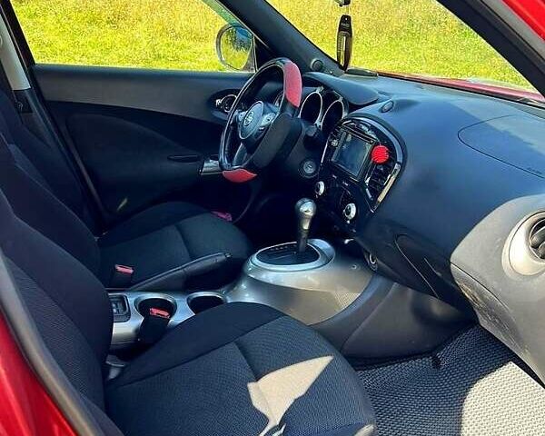 Червоний Ніссан Жук, об'ємом двигуна 1.6 л та пробігом 125 тис. км за 9700 $, фото 3 на Automoto.ua