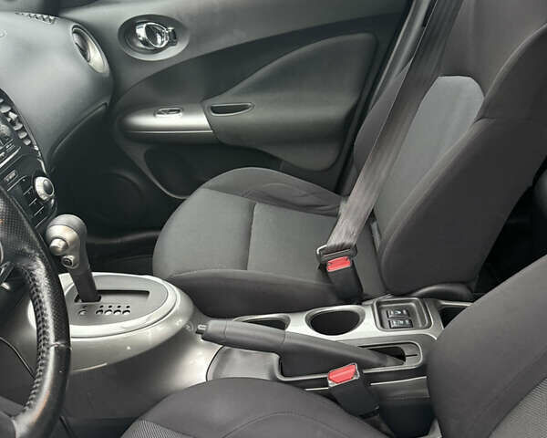 Червоний Ніссан Жук, об'ємом двигуна 1.6 л та пробігом 166 тис. км за 9600 $, фото 5 на Automoto.ua