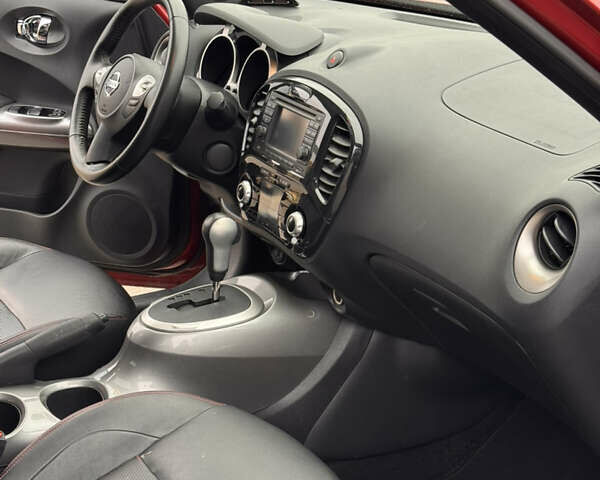 Червоний Ніссан Жук, об'ємом двигуна 1.6 л та пробігом 86 тис. км за 9999 $, фото 17 на Automoto.ua