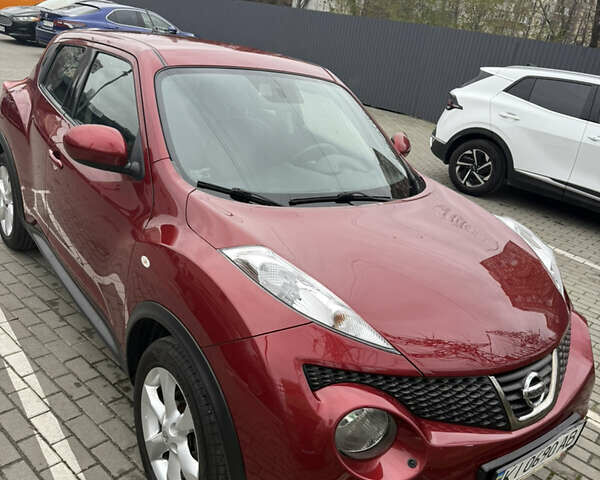 Червоний Ніссан Жук, об'ємом двигуна 1.6 л та пробігом 166 тис. км за 9600 $, фото 1 на Automoto.ua