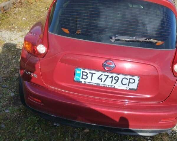 Червоний Ніссан Жук, об'ємом двигуна 1.6 л та пробігом 159 тис. км за 8900 $, фото 4 на Automoto.ua