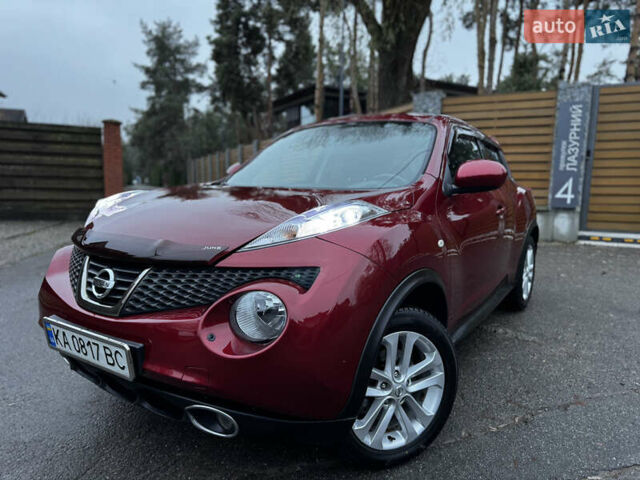 Червоний Ніссан Жук, об'ємом двигуна 1.6 л та пробігом 97 тис. км за 10750 $, фото 4 на Automoto.ua