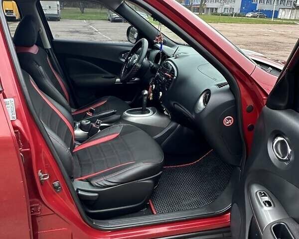 Красный Ниссан Жук, объемом двигателя 1.6 л и пробегом 214 тыс. км за 9000 $, фото 3 на Automoto.ua