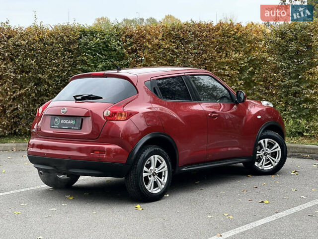 Красный Ниссан Жук, объемом двигателя 1.6 л и пробегом 130 тыс. км за 10500 $, фото 19 на Automoto.ua