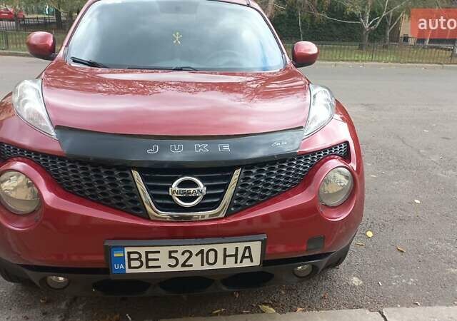 Червоний Ніссан Жук, об'ємом двигуна 1.6 л та пробігом 199 тис. км за 9700 $, фото 9 на Automoto.ua