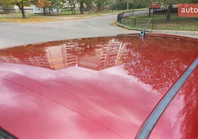 Червоний Ніссан Жук, об'ємом двигуна 1.6 л та пробігом 199 тис. км за 9700 $, фото 11 на Automoto.ua