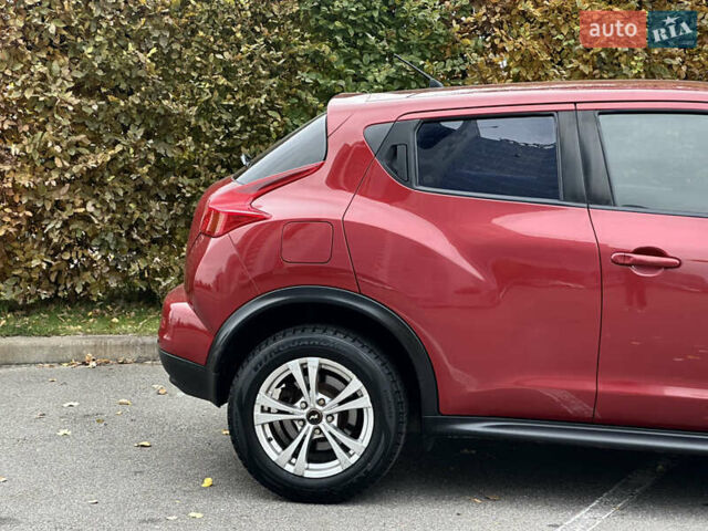 Красный Ниссан Жук, объемом двигателя 1.6 л и пробегом 130 тыс. км за 10500 $, фото 23 на Automoto.ua