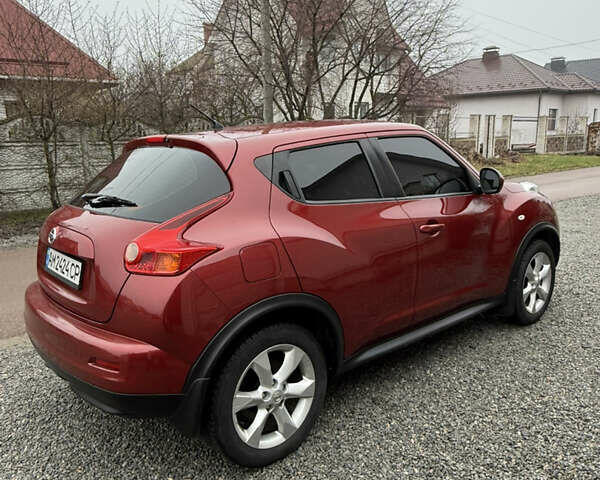 Красный Ниссан Жук, объемом двигателя 1.6 л и пробегом 93 тыс. км за 11000 $, фото 4 на Automoto.ua