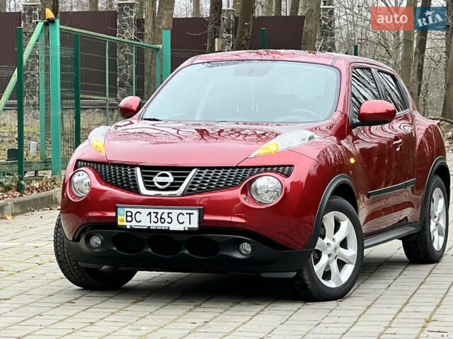 Червоний Ніссан Жук, об'ємом двигуна 1.6 л та пробігом 98 тис. км за 10999 $, фото 4 на Automoto.ua