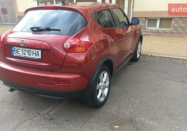 Червоний Ніссан Жук, об'ємом двигуна 1.6 л та пробігом 199 тис. км за 9700 $, фото 6 на Automoto.ua