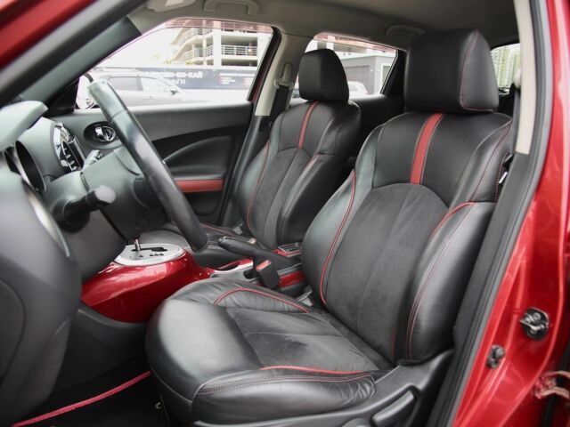 Красный Ниссан Жук, объемом двигателя 1.6 л и пробегом 154 тыс. км за 9700 $, фото 6 на Automoto.ua