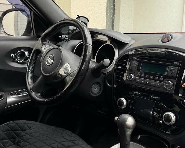 Красный Ниссан Жук, объемом двигателя 1.6 л и пробегом 92 тыс. км за 11500 $, фото 10 на Automoto.ua