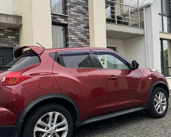 Красный Ниссан Жук, объемом двигателя 1.6 л и пробегом 92 тыс. км за 11500 $, фото 2 на Automoto.ua