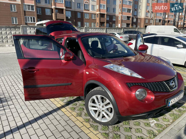 Червоний Ніссан Жук, об'ємом двигуна 1.6 л та пробігом 94 тис. км за 11500 $, фото 17 на Automoto.ua