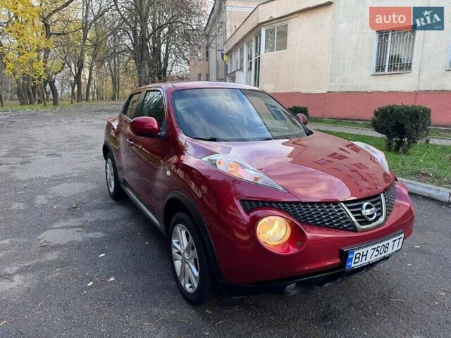 Красный Ниссан Жук, объемом двигателя 1.6 л и пробегом 170 тыс. км за 10300 $, фото 7 на Automoto.ua